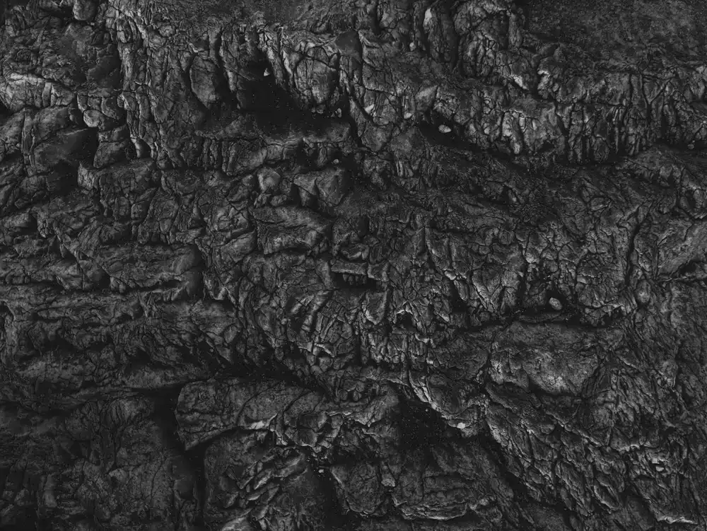 Dark rugged mountain surface